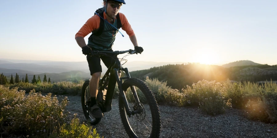 young-adult-using-electric-bike-country-side